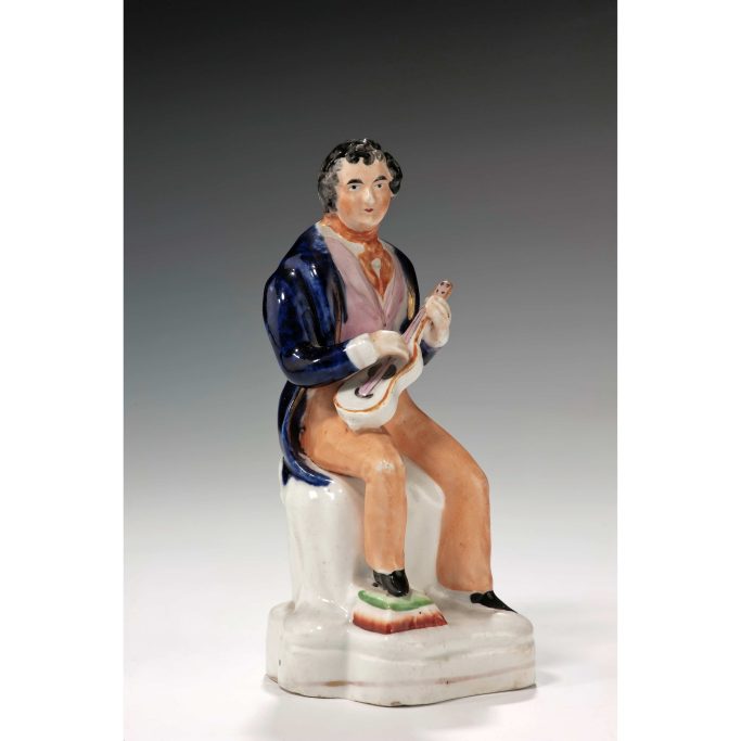 Search for antique Staffordshire figures of musicians.