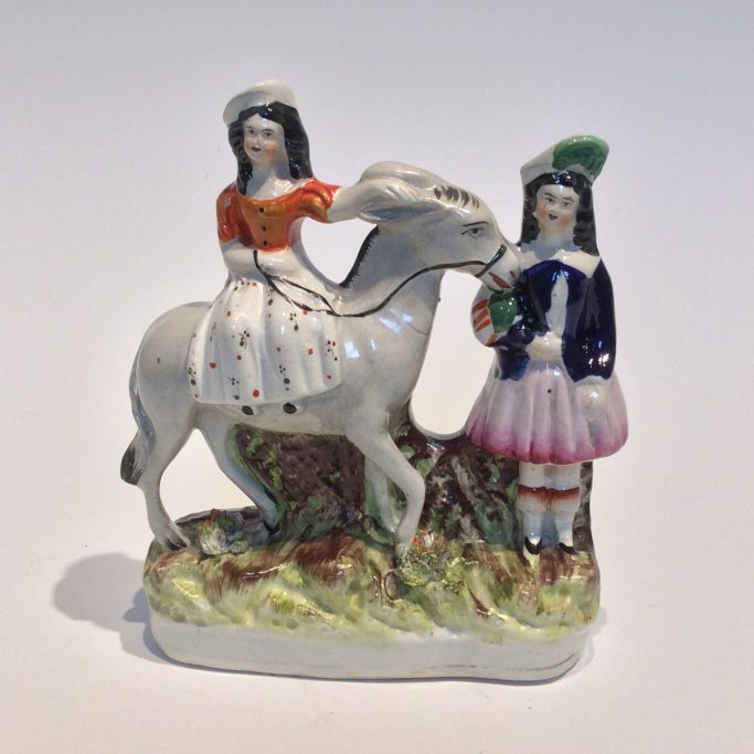 Find an antique Staffordshire figure of children and a donkey for sale.