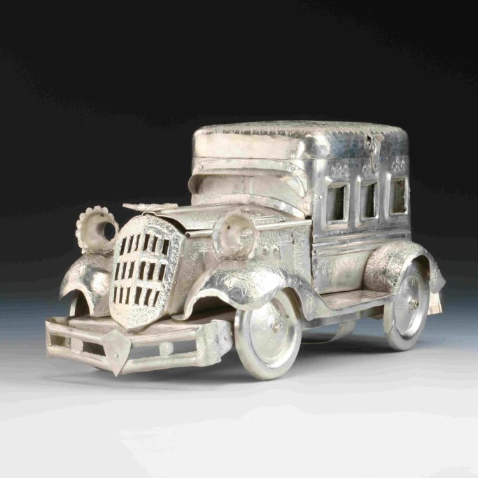 Search for silver plated model of a car for sale in UK.