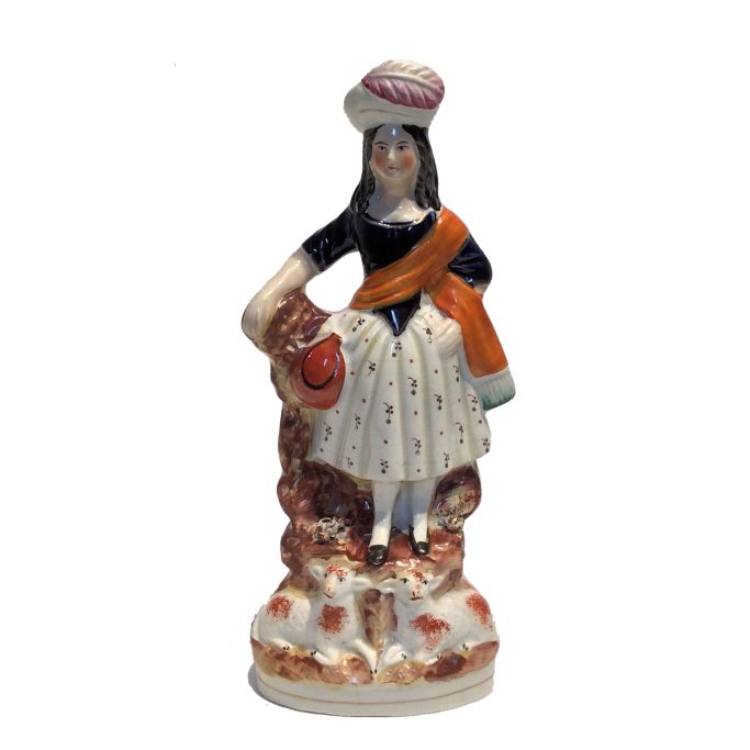 Find an antique Staffordshire figure of a shepherdess and lambs for sale.