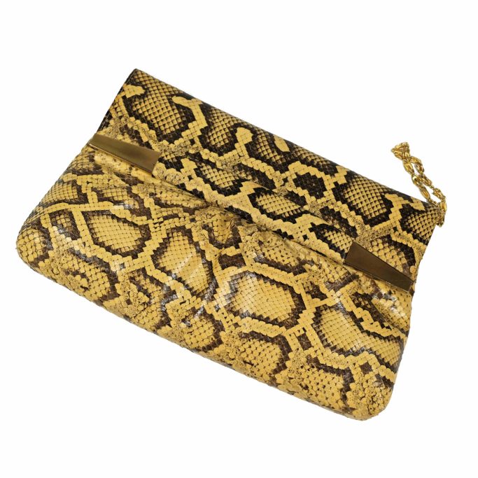Look for a vintage ladies python skin clutch handbag for sale