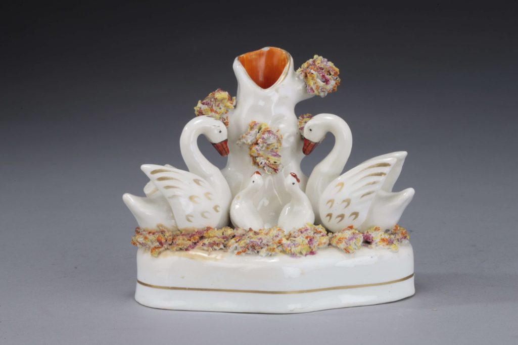Search for a Victorian Staffordshire figure of a swan spill vase group for sale