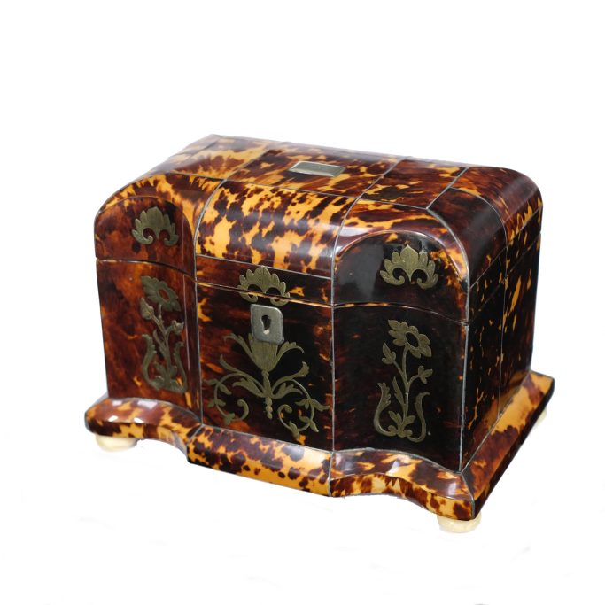 Find an antique Regency tortoiseshell tea caddy with brass inlay for sale.