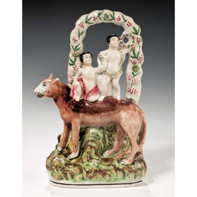 Find rare antique Staffordshire figure of a lion and two cherubs for sale.