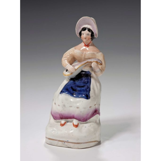 Search for antique musical Staffordshire figures for sale.